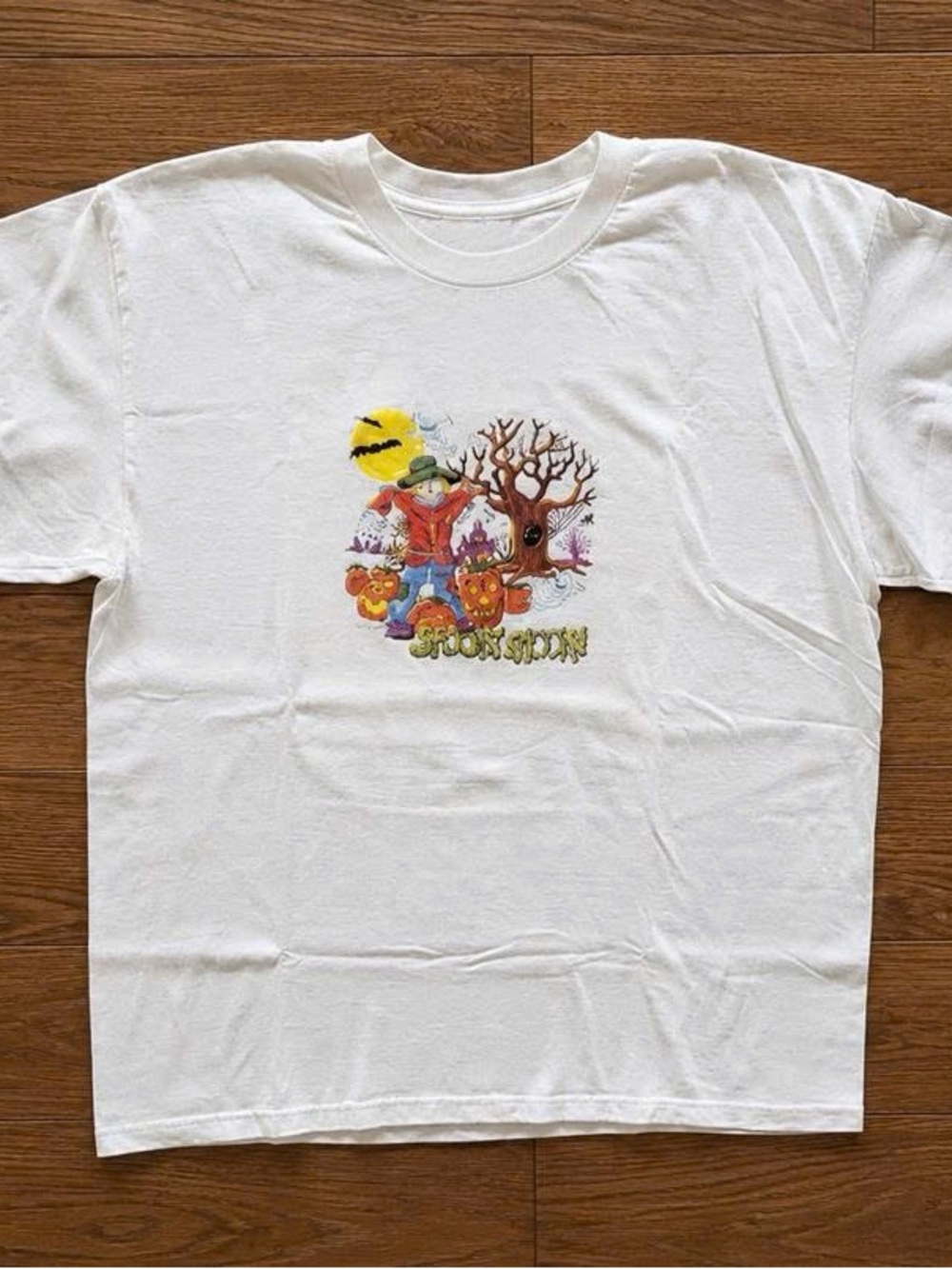 Bella Canvas White Graphic Crop Top with Colorful Halloween Illustration